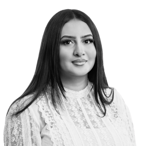 women with dark hair in a jumper