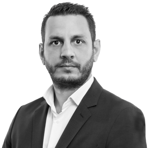 man in suit and white shirt