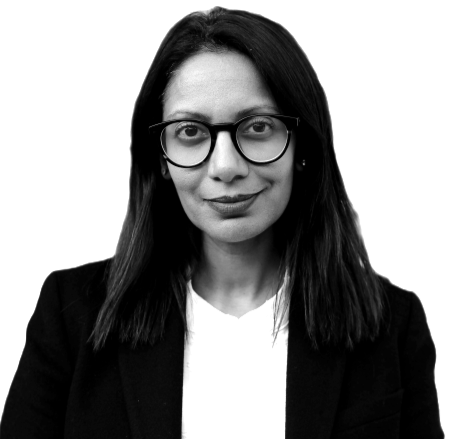 Brinda Granthrai, an asian woman in a light shirt and black jacket